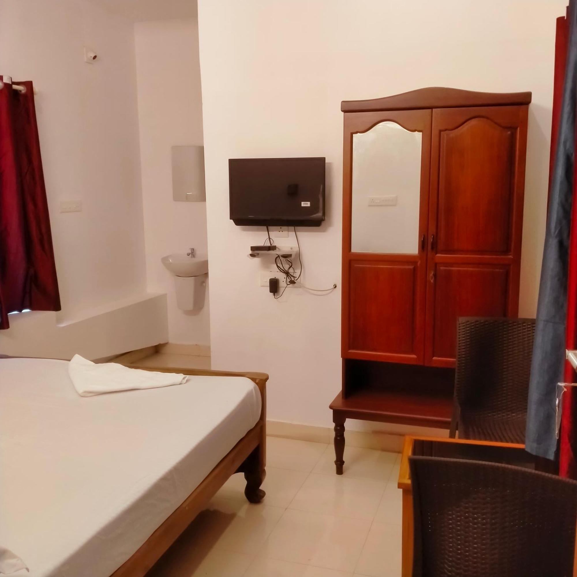 Agape Marari Apartamento Mararikulam Quarto foto